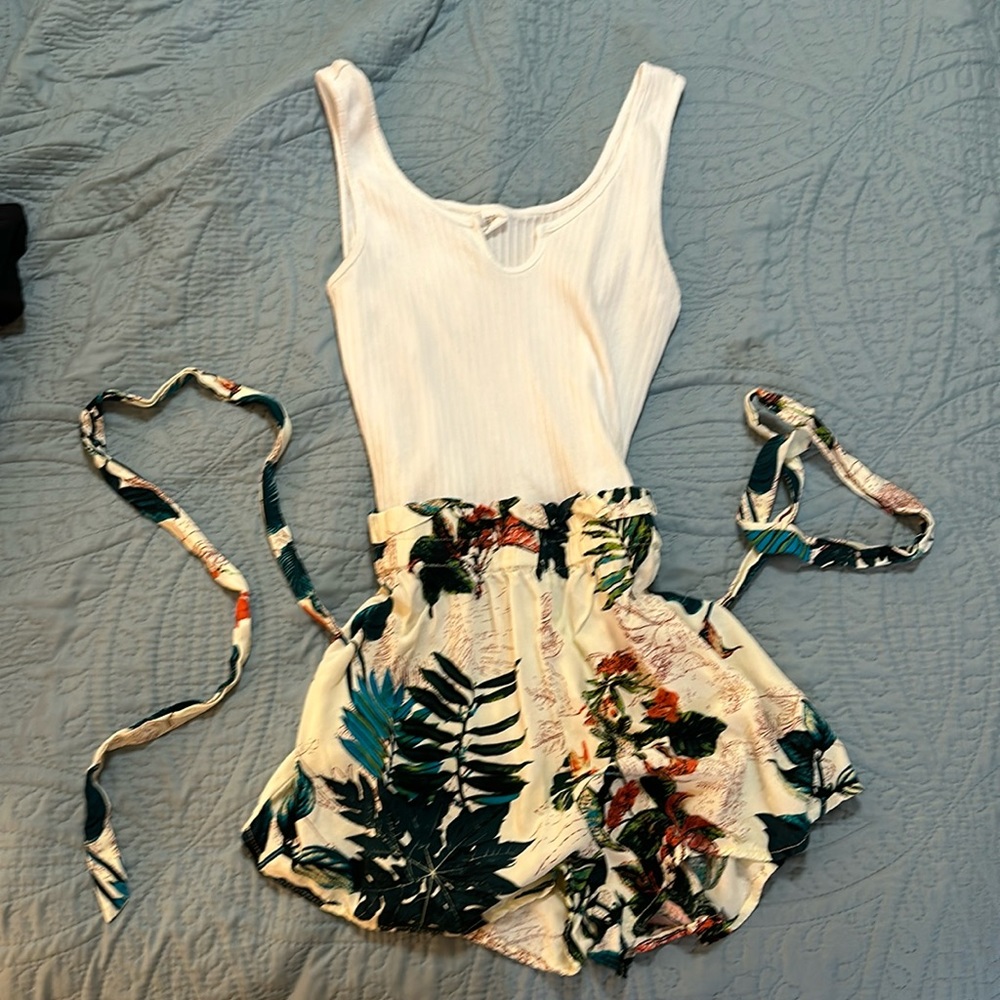 Little white/floral romper size M but pretty small (can fit both - stretchy)